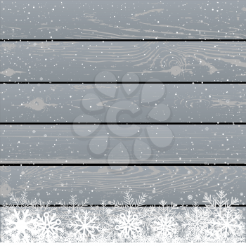 Winter snowflake wooden backdrop. Christmas snow gray wood background