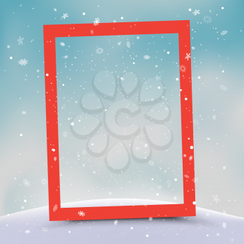 Christmas red vertical photo frame in blue sky background. Winter hills and falling snow. Holiday snapshot template in nature backdrop