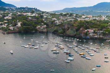 Ischia Porto, coastal landscape with moored boats, Mediterranean Sea, Italy