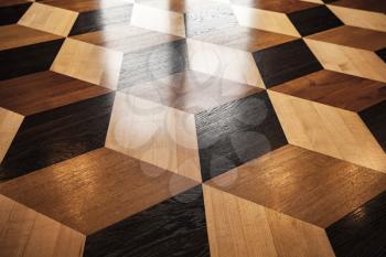 Classic old wooden parquet, volume cubes illusion. Shining flooring background photo