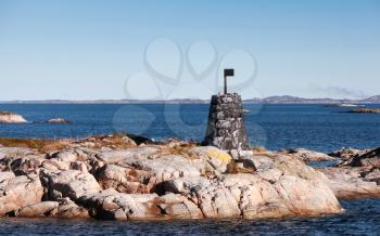 Black Stone Cairn, Norway. Traditional Scandinavian old navigation sea mark