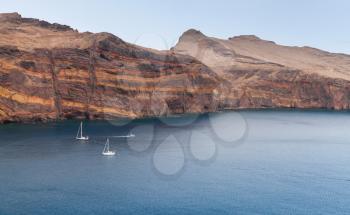 Sailing yachts in bay of Ponta de Sao Laurenco. Coastal landscape of Madeira, Portugal