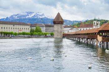 Lucerne city, central Switzerland, the capital of the canton of Lucerne. Cityscape with Chapel Bridge with Water Tower, a fortification from the 13th century