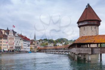 Chapel Bridge with Water Tower; fortification from the 13th century in Lucerne city; central Switzerland
