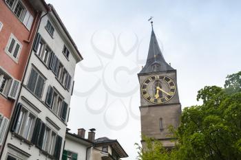 Cityscape of old Zurich, Switzerland. Clock tower of St. Peter church