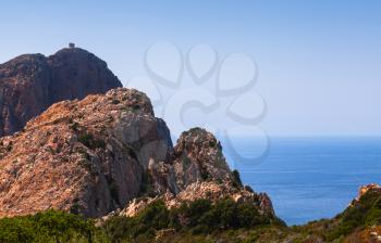 Landscape of French Mediterranean island Corsica. Corse-du-Sud, Piana region, tower on the rock