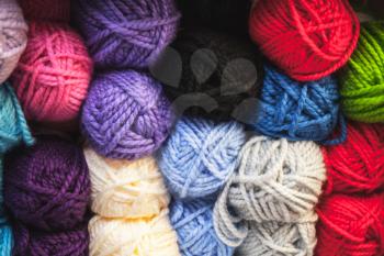 Colorful balls of wool, close-up background photo