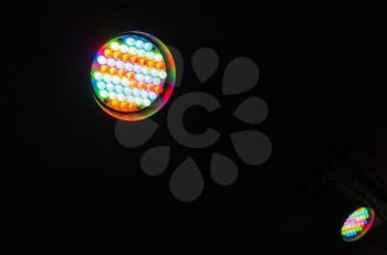 Round colorful LED spot light. Modern stage illumination equipment