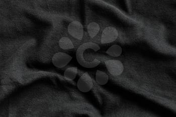 Black fleece texture, soft napped insulating fabric made from polyester, wavy pattern