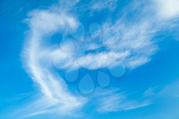 Natural blue sky with cirrus clouds at daytime. Background photo texture
