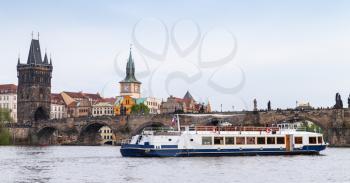 Small passenger ship on Vltava river. Prague, Czech Republic