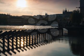 Dam on Vltava river. Old Prague in summer evening, Czech Republic