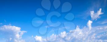 White clouds in blue sky, natural panoramic background photo