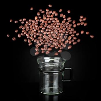 Blast cloud of coffee beans over mug made of glass on black background