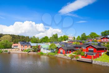 Historical Finnish town Porvoo. Colorful wooden houses and barns on the river coast