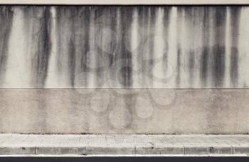 Old concrete wall and roadside. Abstract industrial interior background texture