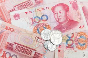 Chinese yuan renminbi banknotes and coins, close up photo background