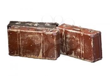 Old brown cheap suitcases for travel isolated over white background
