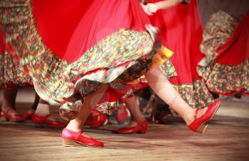 Bright fragment of fast Russian folk dance with red girls waved skirt