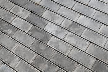 Background texture of modern gray cobblestone pavement