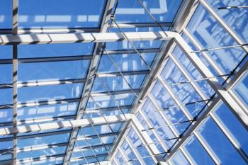 Abstract high-tech architecture background, internal structure of glass roof arch with lockable windows sections