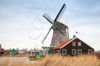 Windmill in Zaanse Schans town. It is one of the popular tourist attractions of the Netherlands
