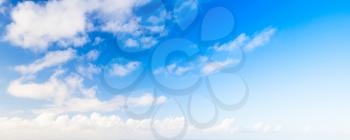 Clouds in blue sky, panoramic background photo texture