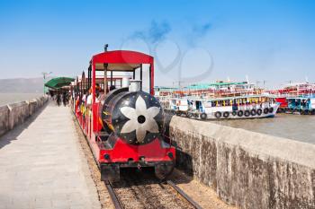 Tourist train to the Elephanta caves on Elephanta Island, India