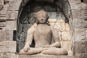 Buddha statue in Borobudur Temple, Java island, Indonesia.