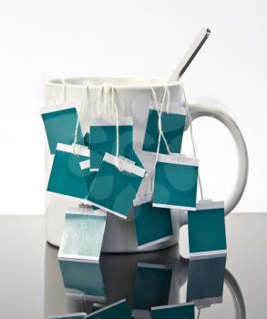 Cup of tea with many teabags