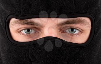 Close-up view of man in black balaclava