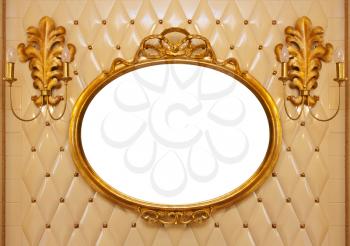 Luxury vintage mirror with gold frame on the wall. Isolated inside