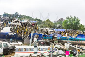 Recovery of old planes at the aircraft cemetery. Passenger liner with broken fuselage.