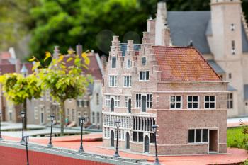 City street with buildings in european style, miniature scene outdoor, europe. Mini figures with high detaling of objects, realistically diorama