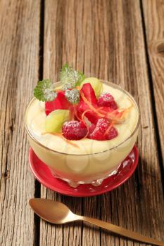 Bowl of creamy pudding with fresh fruit 