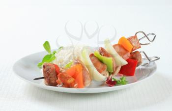 Pork and chicken skewers with white rice