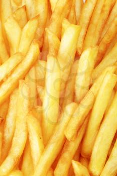 Macro of tasty French fries - full frame