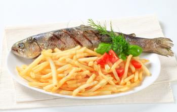 Dish of grilled trout and French fries