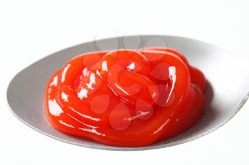 Tomato sauce on a spoon
