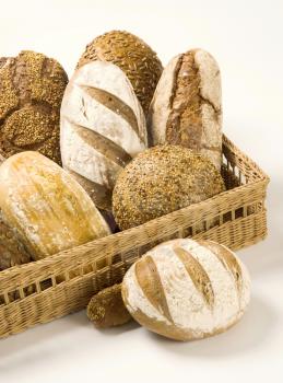 Assorted loaves of bread
 in a basket