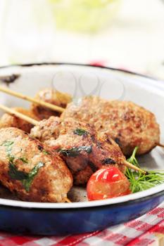 Minced meat kebabs and pan roasted mushrooms 