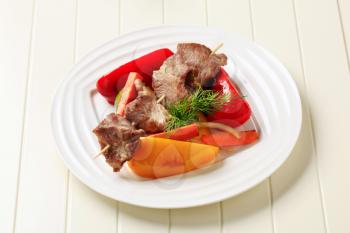 Grilled meat on skewer with bell peppers