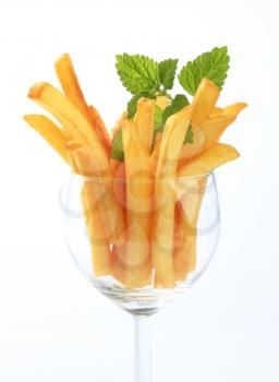 Fresh French fries in a wine glass
