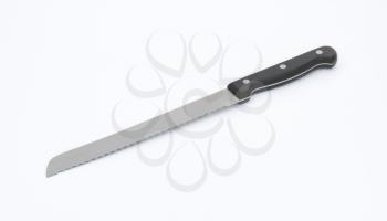 long kitchen knife with serrated blade
