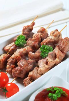 Pork skewers and tomato dipping sauce