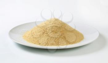 Dry bread crumbs on plate