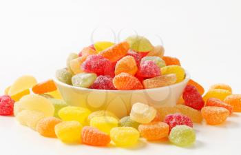 Fruit-shaped gummy candy coated in granulated sugar