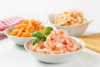 Bowls of plain and seasoned shrimps