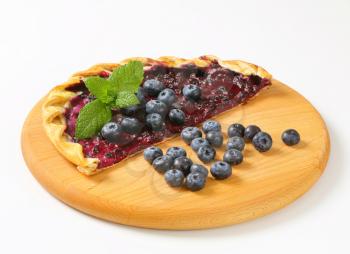 Tarte flambee with quark and blueberries