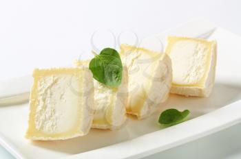 Halved Crottins de Chevre - French goat's milk cheese